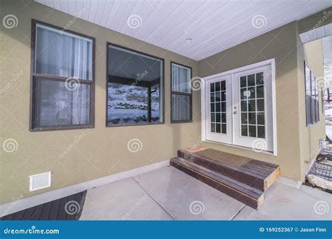 Double Glass Cottage Pane Doors Opening Onto Patio Stock Image - Image ...