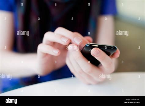 Hand Holding Mobile Phone High Resolution Stock Photography And Images