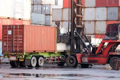 The Truck Is Waiting For The Container In The Container Yard Stock