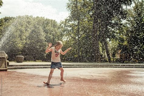 "People: Girl Having Fun In Splashing Water" by Stocksy Contributor ...