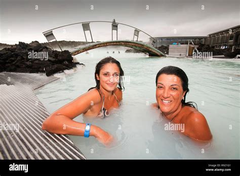 Photograph Of Two Women In Relaxing In A Hot Spring And Smiling At Camera Blue Lagoon Keflavik