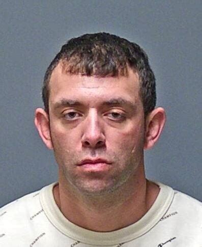 Manchester police arrest two men on drug and gun charges | Crime ...
