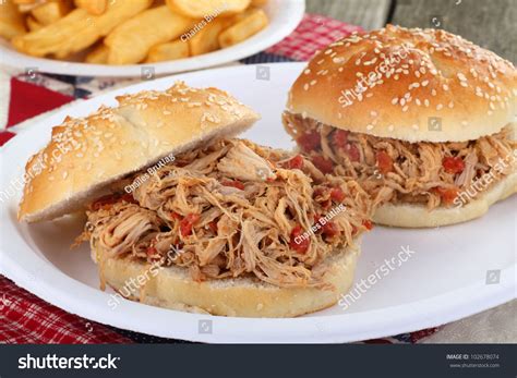 Two Pulled Pork Sandwiches On Sesame Seed Buns Stock Photo 102678074