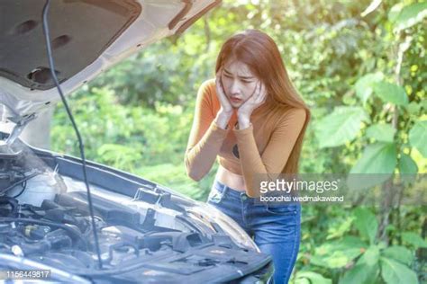 Woman Car Broke Down Photos And Premium High Res Pictures Getty Images