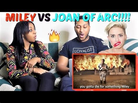 Epic Rap Battles Of History Miley Cyrus Vs Joan Of Arc REACTION