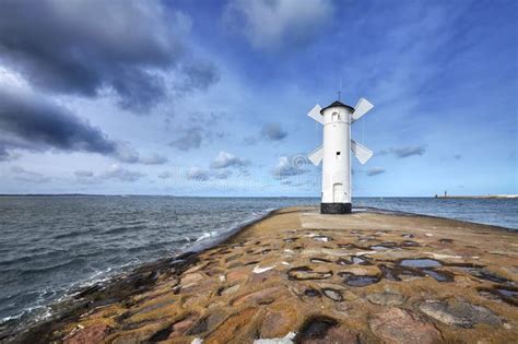 Windmill Lighthouse in Swinoujscie, Poland. Stock Image - Image of windy, europe: 108663499