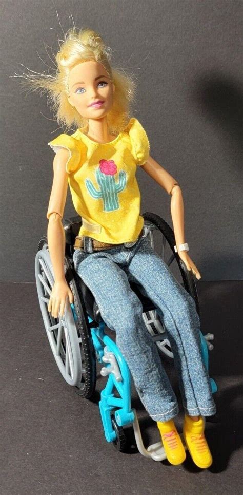 ARTICULATED BARBIE IN WHEELCHAIR DRESSED | #4541222422