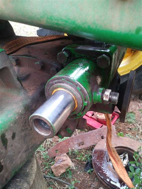 JOHN DEERE 6225 MFWD POWER STEERING CYLINDER removal - TractorByNet
