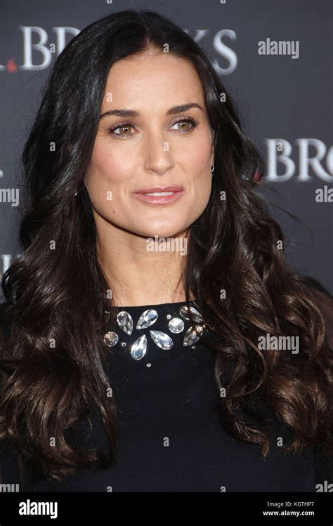 demi moore arriving   brooks premiere   chinese theatre  los