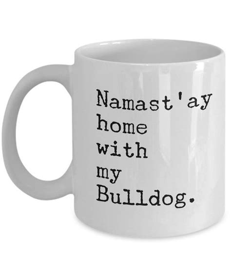 A White Coffee Mug That Says Namastay Home With My Poodle