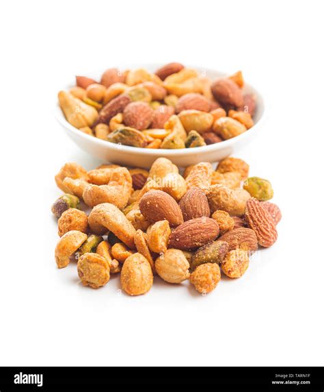 Spicy Flavoured Nuts Mix Of Nuts Isolated On White Background Stock