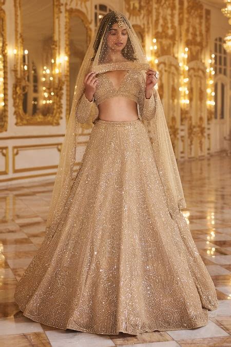 Buy Gold Net Embroidered Pearls Deep V And Beads Work Bridal Lehenga