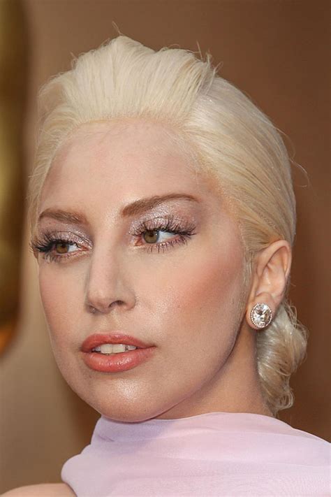 Lady Gaga Straight Golden Blonde Bun Pompadour Hairstyle Steal Her Style