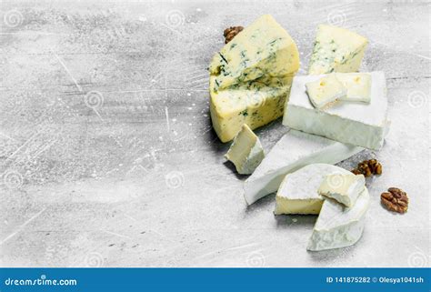 Brie and Blue Cheese and Nuts Stock Photo - Image of natural, mold ...