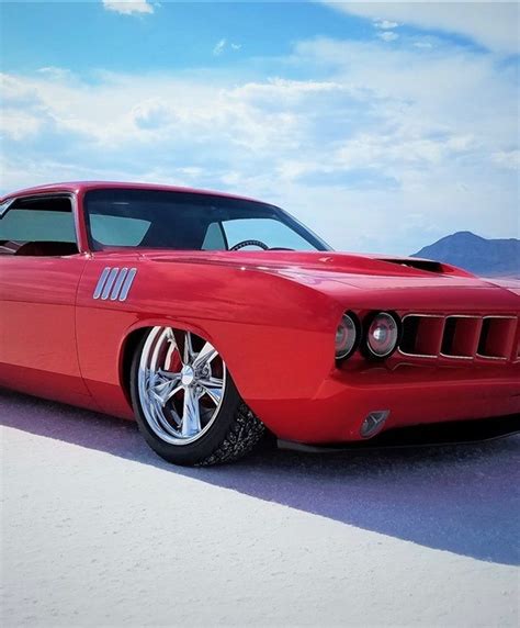 Utwo 1971 Plymouth Cuda Barrett Jackson