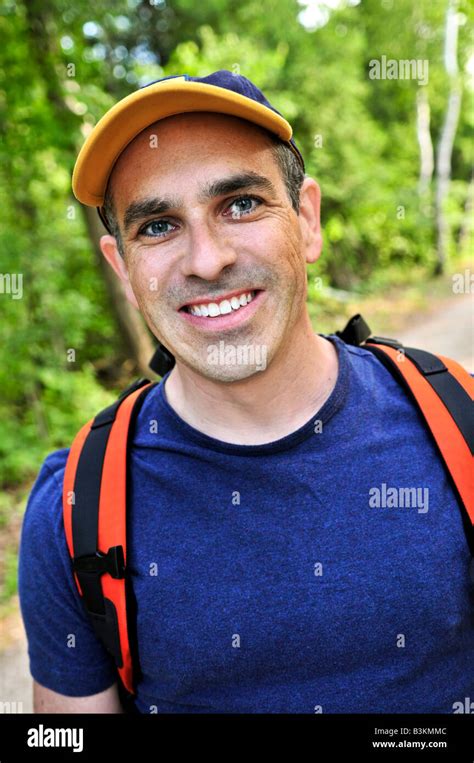 Portrait Of Happy Middle Aged Man On A Forest Trail Stock Photo Alamy