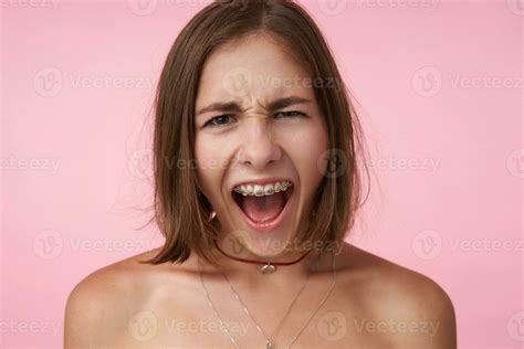 Stressed Young Short Haired Brunette Lady With Bob Haircut Frowning Her