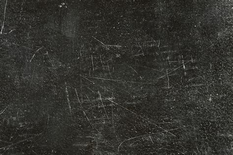 Premium Photo Texture Scratched Black Plastic