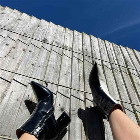 Black and white heeled boots Contrast black and... - Depop