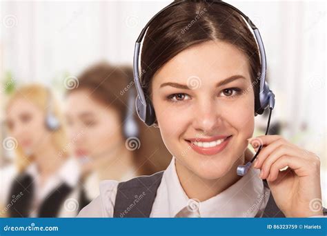 Portrait Of Happy Smiling Cheerful Support Phone Operator In Headset