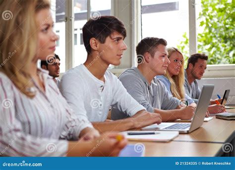 College students in class stock image. Image of notebook - 21324335