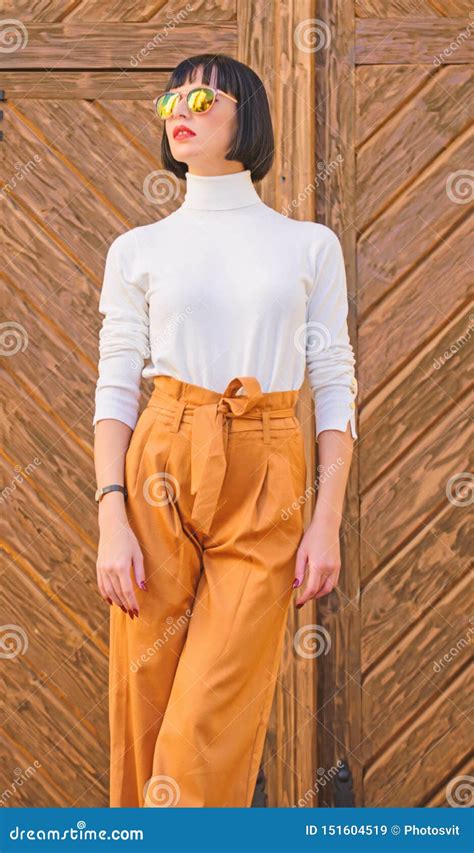 Fashion And Style Concept Woman Fashionable Brunette Stand Outdoors Wooden Background Stockbild