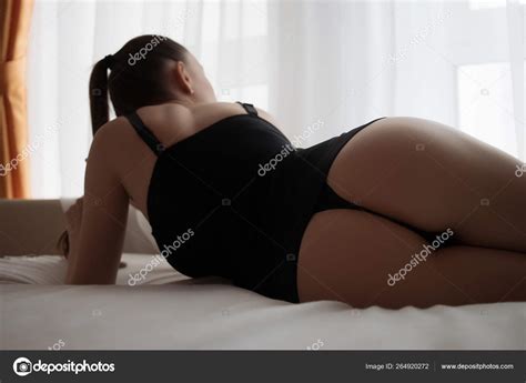 Sensual Nude Woman In Lingerie On Bed In Room Stock Photo Kstudio