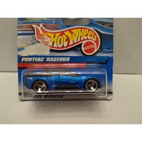 PONTIAC RAGEOUS BLUE 1 64 HOT WHEELS CARTON MAL DAMAGED CARD BCN STOCK CARS