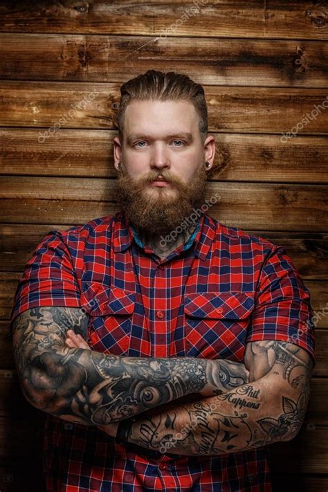 Brutal Man With Tattooes And Beard Stock Photo Fxquadro 63870107