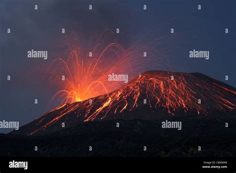 Lava Bomb Trajectories Visible During Nighttime Vulcanian Eruption Of