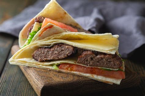 Tortilla Burger Hamburger With Cheese And Vegetables Stock Image