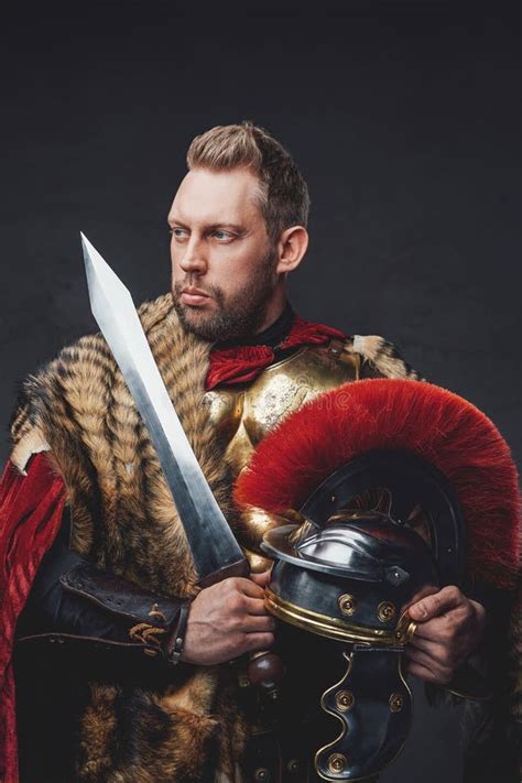 Legionnaire In Fur And Golden Armor With Gladius Stock Photo Image Of