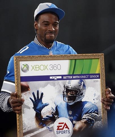 Calvin Johnson beats Cam Newton for Madden '13 cover