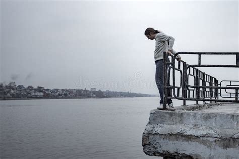 Depressed Sad Frustrated Man Stands on the Edge of the Bridge To Jump ...