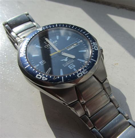 Citizen wr 100 sapphire day/date wr 100 mens watch - Catawiki
