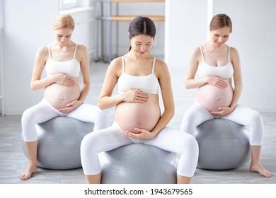 Cute Diverse Pregnant Women Naked Tummy Stock Photo