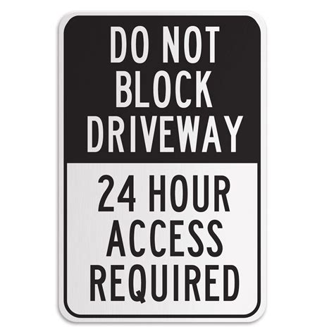 DO NOT BLOCK DRIVEWAY 24 HOUR ACCESS REQUIRED American Sign Company