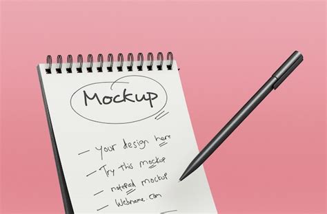 Premium PSD | Notepad mockup with a pen