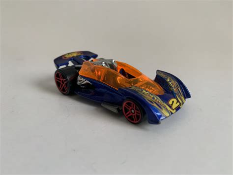MINIATURA HOT WHEELS 1 64 LOOSE OPEN ROAD STER 2001 AZUL E LARANJA