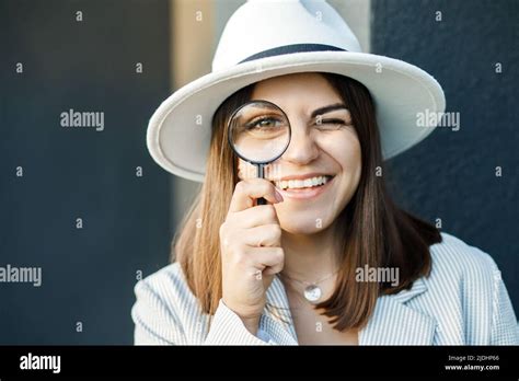 Closeup Looking Into Magnifying Glass Hi Res Stock Photography And