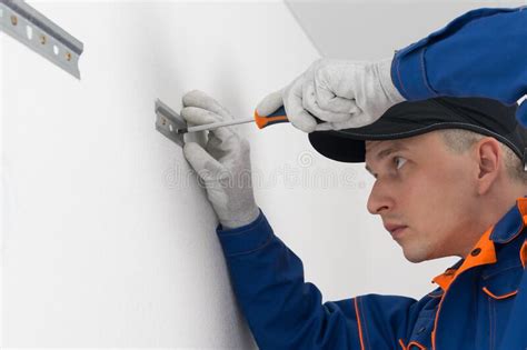 Close Up Naked Torso Of The Bartender On A White Background Holding A Tray With A Reserved