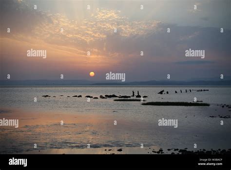 Morecambe Bay sunset sky Stock Photo - Alamy