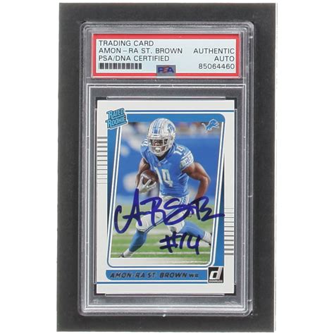 Amon Ra St Brown Signed 2021 Donruss 284 RR RC PSA Pristine Auction