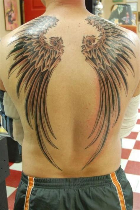 Tattoos For Men Tatouage Dos Homme Tatouage Belier Aile D Ange Tatouage