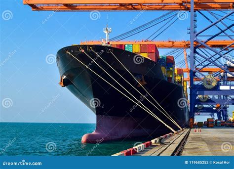 Big Container Vessel Berthing At Port Prepare For Discharging On A ...