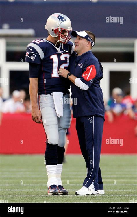 New England Patriots quarterback Tom Brady (12) and offensive ...