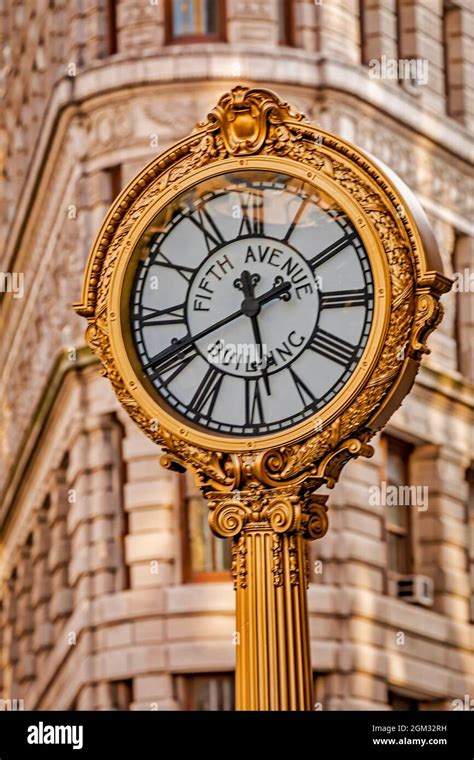 Flatiron and Fifth Ave Clock NYC - Close view to the iconic New York ...