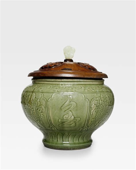 A Carved Longquan Celadon Wine Jar Late Yuan Early Ming Dynasty