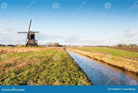 Dutch Polder Mill Against A Blue Sky Stock Image Image Of Molen Blue