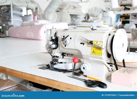 Professional Sewing Machine Overlock In The Workshop Equipment For